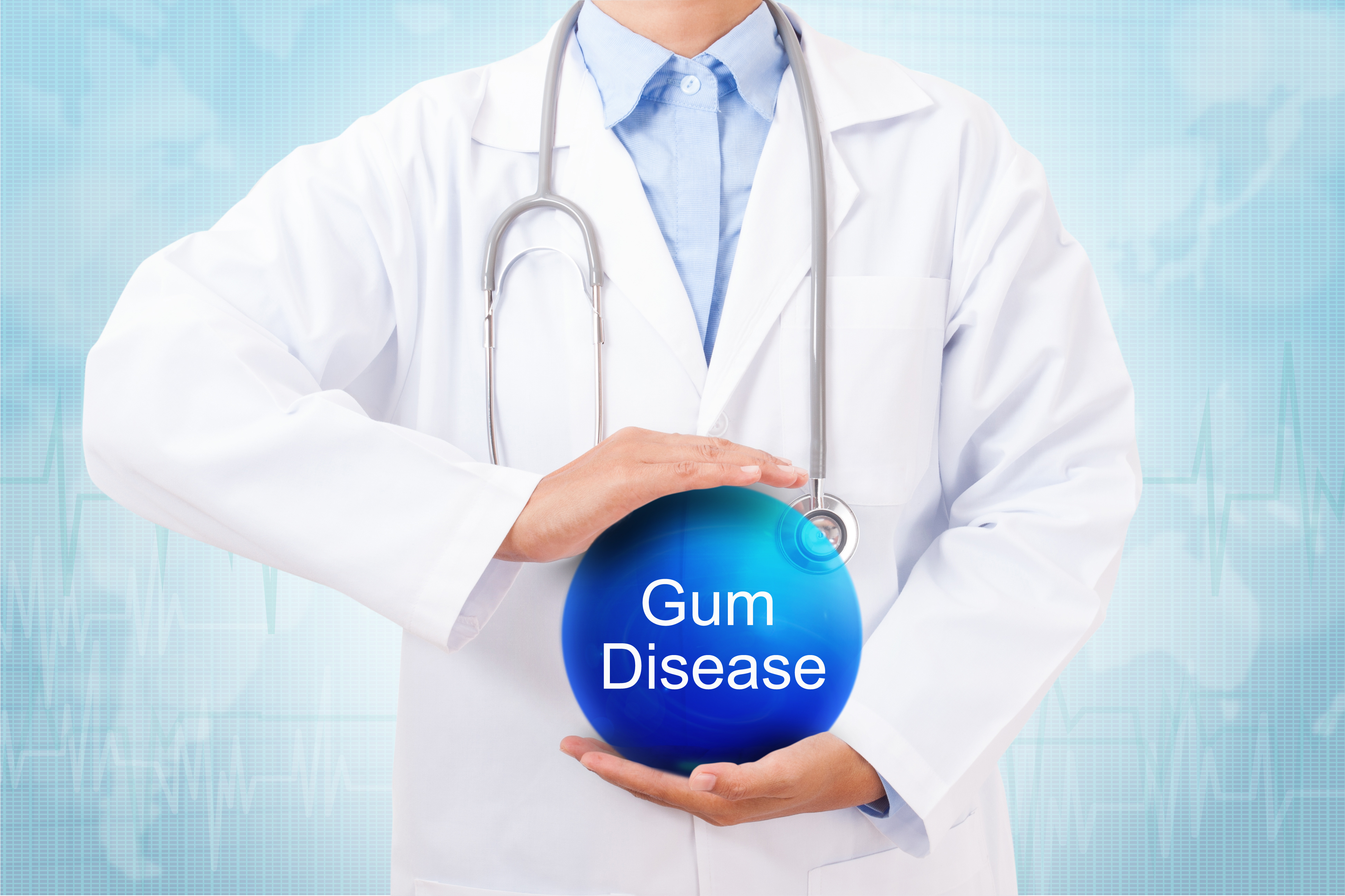 Doctor holding blue crystal ball with gum disease sign on medical background.