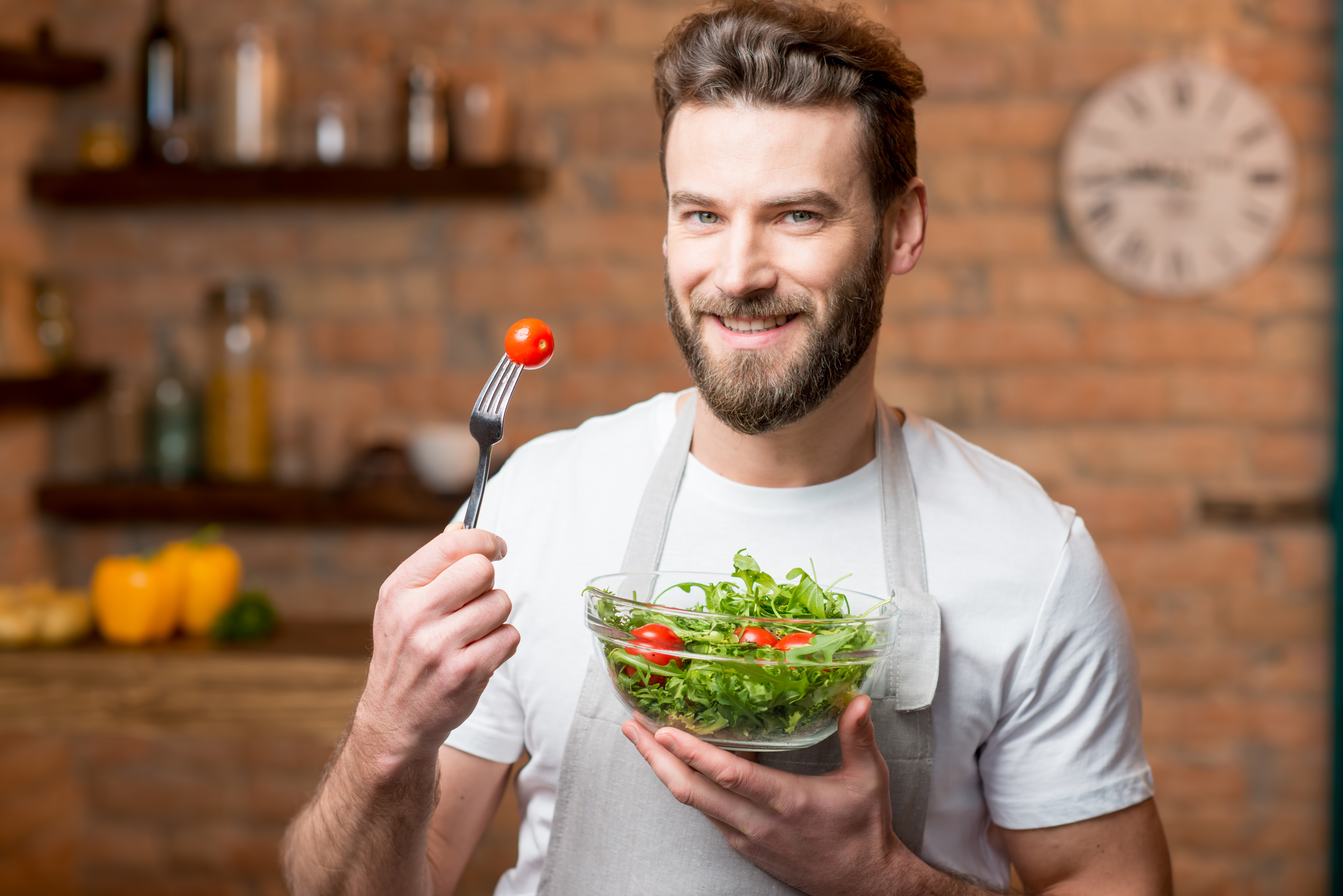 Man eating salad